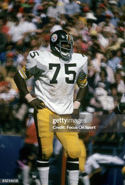 S: Defensive lineman Joe Greene of the Pittsburgh Steelers waits on the Atlanta Falcons offense to come to the line during a mid circa 1970's NFL...