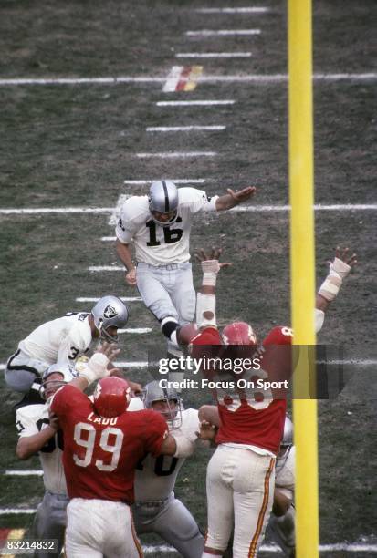 S: George Blanda quarterback /kicker of the Oakland Raiders kicks a field-goal against the Kansas City Chiefs during a early circa 1970's NFL game at...