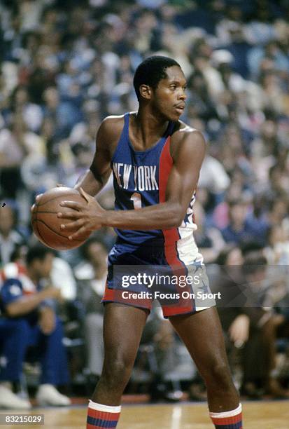S: Nate Archibald of the New York Nets looks to pass the ball against the Washington Bullets during a mid circa 1970's NBA basketball game at the...