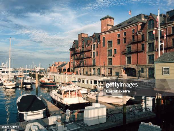 boats docked at boston harbor - boston harbour stock pictures, royalty-free photos & images