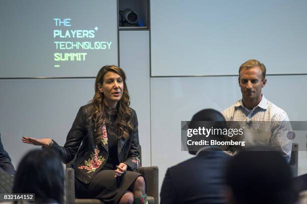 Tina Sharkey, co-founder and chief executive officer of Brandless Inc., left, speaks as Don Faul, chief executive officer of Athos, listens during...