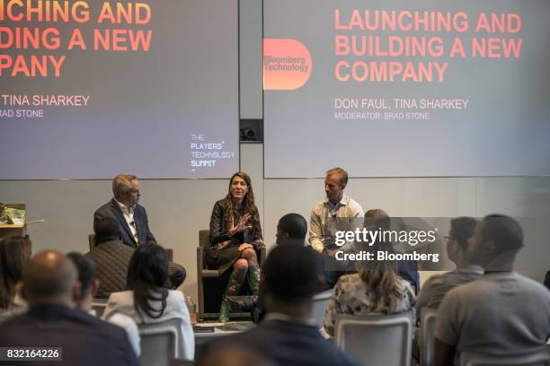 Tina Sharkey, co-founder and chief executive officer of Brandless Inc., center, speaks as Don Faul, chief executive officer of Athos, right, listens...