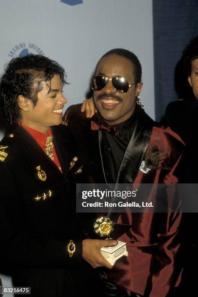 Musician Stevie Wonder and singer Michael Jackson attending 28th Annual Grammy Awards on February 25, 1986 at the Shrine Auditorium in Los Angeles,...