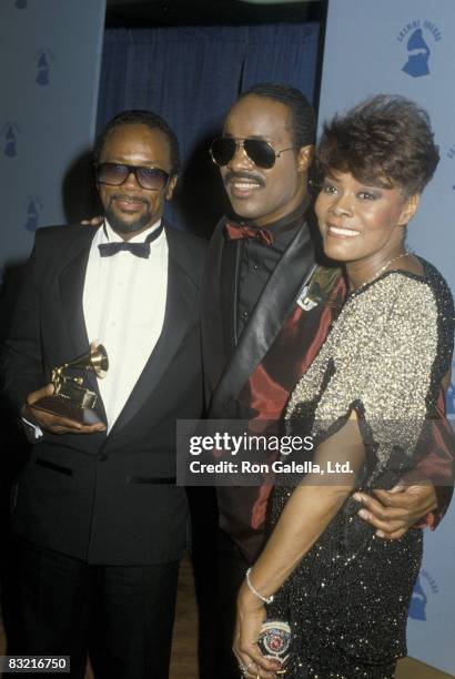 Musician Stevie Wonder, singer Dionne Warwick and producer Quincy Jones attending 28th Annual Grammy Awards on February 25, 1986 at the Shrine...