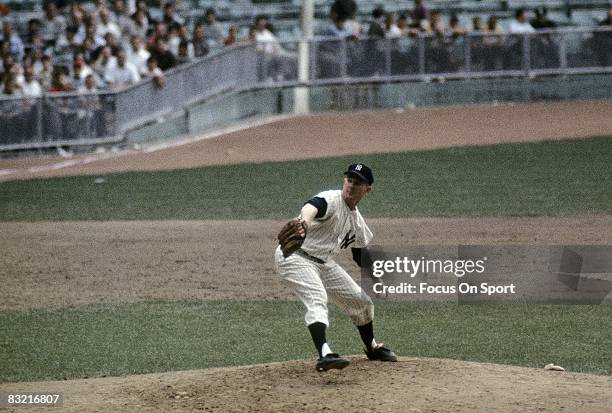 S: Pitcher Whitey Ford of the New York Yankees pitches during circa early 1960's Major League Baseball game at Yankee Stadium in Bronx, New York....