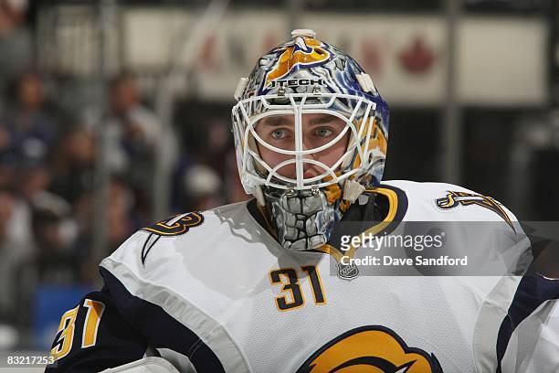 Goaltender Jonas Enroth of the Buffalo Sabres looks on against the Toronto Maple Leafs during their pre season NHL game at the Air Canada Centre on...