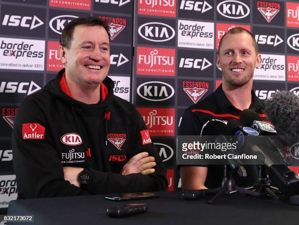 Bombers coach John Worsfold and James Kelly of the Bombers are seen during a press conference to announce the reirement of James Kelly, at the...