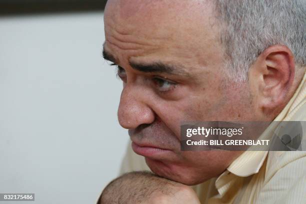 Grandmaster chess player Garry Kasparov looks at his opponent grandmaster Levon Aronian during their match in day two of the Grand Chess Tour at the...