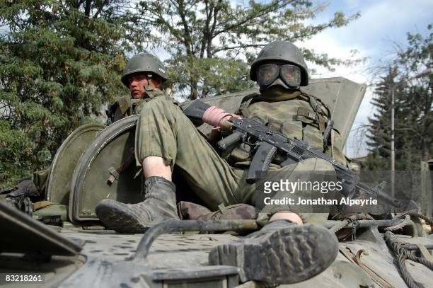 An APC loaded with Russian soldiers returns to the capital city from Georgian frontlines on August 16, 2008 in Tskhinvali, South Ossetia. Hundreds of...