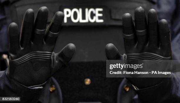 James Wharton wearing a Civilian Responder suit , worn by police in situations where there is believed to be a chemical threat, which includes butyl...