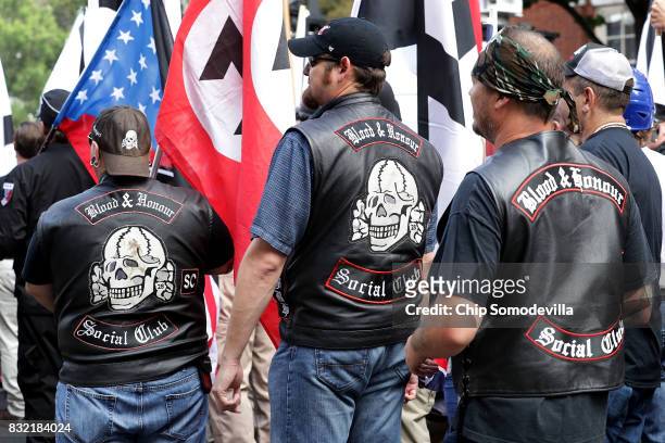 Hundreds of white nationalists, neo-Nazis and members of the "alt-right" march down East Market Street toward Emancipation Park during the United the...