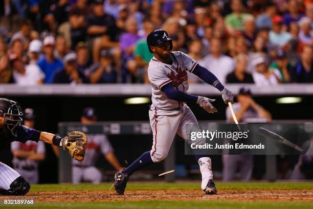 Ozzie Albies of the Atlanta Braves shatters his bat en route to grounding out in the fifth inning during the game against the Colorado Rockies at...