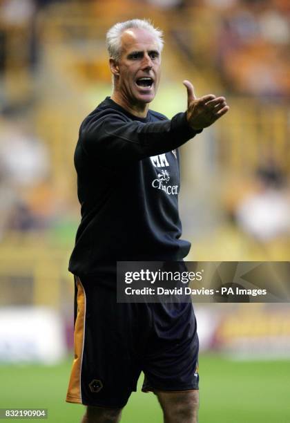 Wolverhampton Wanderer manager Mick McCarthy gestures to his players during the Coca-Cola Championship match against Ipswich Town at the Molineux,...