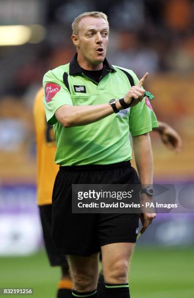 Referee Trever Kettle gestures during the Coca-Cola Championship match between Wolverhampton Wanderers and Ipswich Town at the Molineux,...