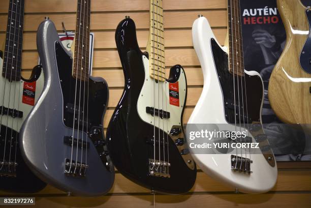 Different guitar models made by US manufacturer Fender are displayed at the Custom Shop of Holocausto Audio Iluminacion Profesional distributor in...