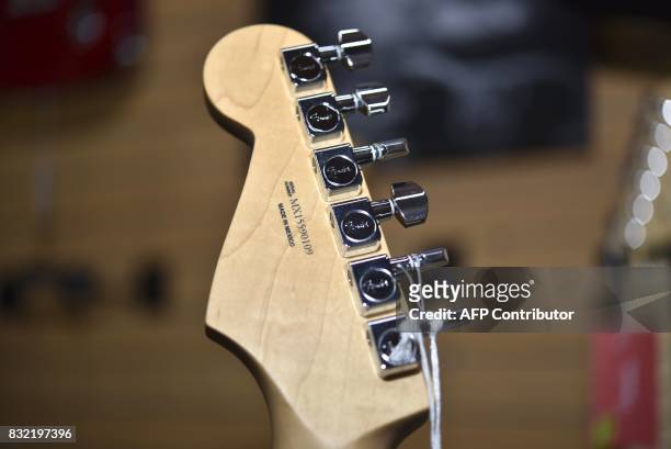 Detail of a model of Telecaster guitar made by US manufacturer Fender displayed at the Custom Shop of Holocausto Audio Iluminacion Profesional...