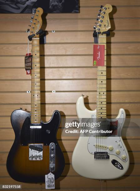 Telecaster guitar made by US manufacturer Fender in Ensenada, Baja California, Mexico and a Stratocaster model made by Fender in Corona, California...