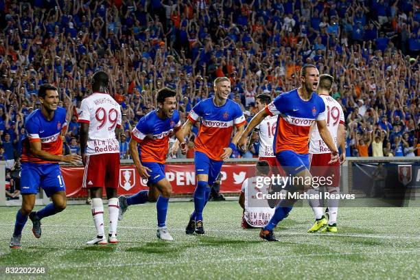 Cincinnati defender Austin Berry celebates after scoring a goal in the second half against the New York Red Bulls during the semifinal match of the...