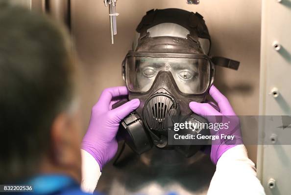 Smart Man Test System A technician prepares for a chemical test on the Smartman test dummy ...