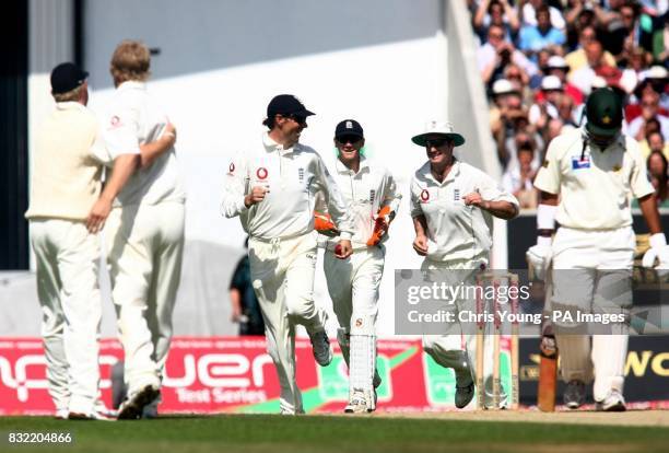 Maarcus Trescothick is all smiles after holding Matthew Hoggard's delivery to dismiss Imran Farhat during the second day of the fourth NPower test...