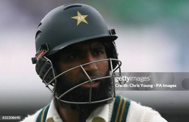 Pakistani batsman Mohammad Yousaf leaves the field, as rain interupts the second day of the fourth NPower test between England and Pakistan, at the...