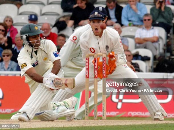 Pakistan batsman Mohammad Hafeez sweeps away a ball as England Wicket keeper Chris Read looks on during the second day of the fourth NPower test...