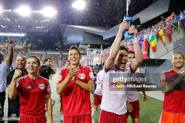 The New York Red Bulls celebrate with fans after defeating FC Cincinnati during the semifinal match of the 2017 Lamar Hunt U.S. Open Cup at Nippert...