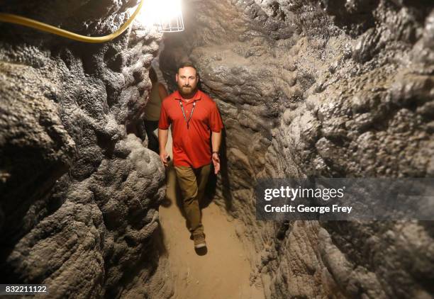 Derek Schumann of Jacobs Engineering Group walks through a narrow section of the newly created BRAUCH training facility at the U.S. Army's Dugway...