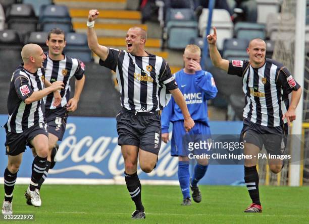 Notts County's Alan White celebrates scoring the opening goal as Rochdale during the Coca-Cola League Two match at Spotland Stadium, Rochdale.
