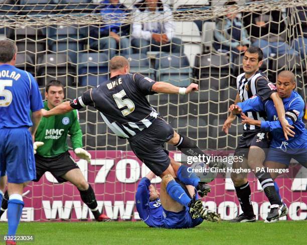 Notts County's Alan White scores against Rochdale during the Coca-Cola League Two match at Spotland Stadium, Rochdale.