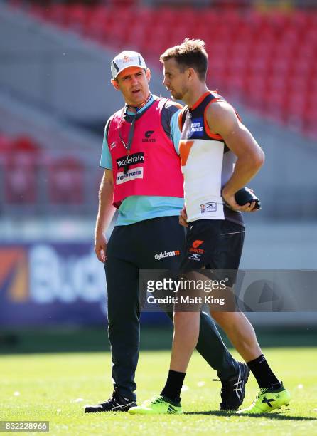Giants head coach Leon Cameron talks to Brett Deledio of the Giants during a Greater Western Sydney Giants AFL training session at Spotless Stadium...