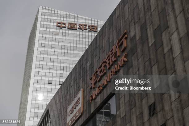 The Ping An Insurance Group Co. Logo is displayed atop the Ping An International Financial Center in Beijing, China, on Wednesday, 09 Aug. 2017. Ping...