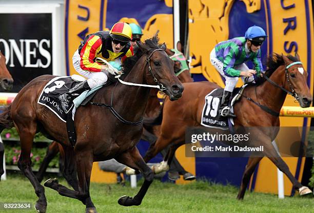 Jockey Craig Newitt riding Alamosa wins the David Jones Toorak Handicap during the Caulfield Guineas Day meeting at Caulfield Racecourse on October...