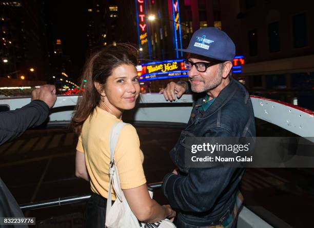 Marisa Tomei and Fisher Stevens join Michael Moore as he leads his Broadway audience to Trump Tower to protest President Donald Trump on August 15,...