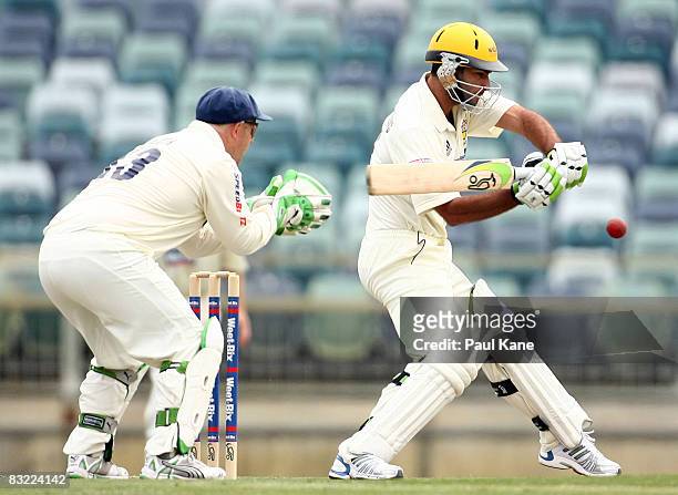 Theo Doropoulos of the Warriors square cuts during day two of the Sheffield Shield match between the Western Australian Warriors and the New South...