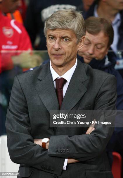 Arsenal's Arsene Wenger watches the action during the Champions League third qualifying round second leg match at the Emirates Stadium, London.