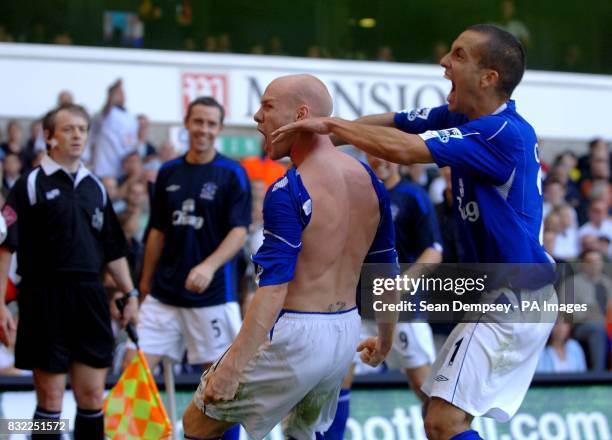 Everton's Andrew Johnson celebrates his goal with Leon Osman