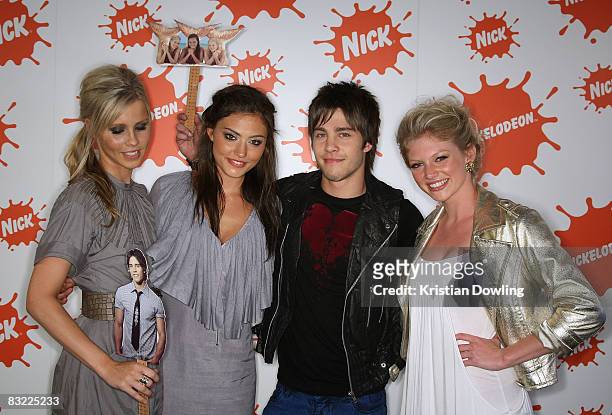 Just Add Water' stars Cariba Heine, Phoebe Tonkin and Claire Holt pose backstage with singer Dean Geyer at the Nickelodeon Australian Kids' Choice...