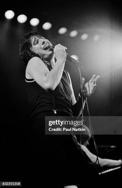 Singer Steve Perry of Journey performs at the Rosemont Horizon in Rosemont, Illinois, June 11, 1983.
