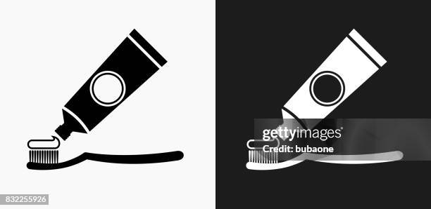 zahnbürste und paste-symbol auf schwarz-weiß-vektor-hintergründe - zahnpasta stock-grafiken, -clipart, -cartoons und -symbole