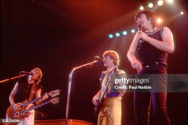 Left to right, Jonathan Cain, Steve Perry and Ross Valory of Journey at the Rosemont Horizon in Rosemont, Illinois, June 11, 1983.