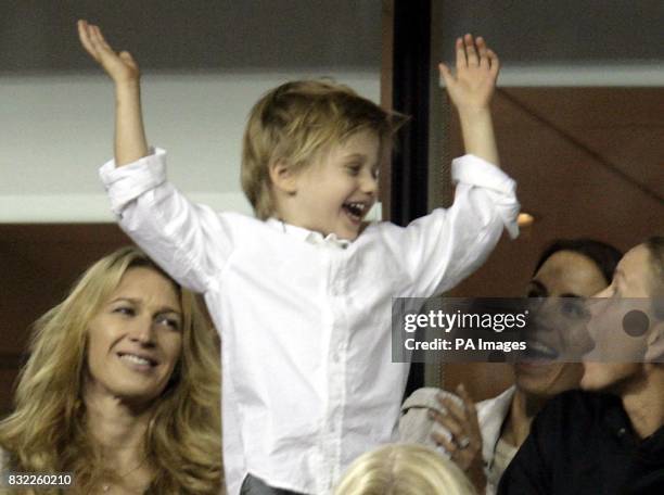 Andre Agassi's son Jaden Gil celebrates with his mother, Steffi Graf , after USA's Andre Agassi beat Marcos Baghdatis in their second round match at...
