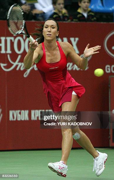 Jelena Jankovic of Serbia returns a ball to Elena Dementieva of Russia during their semifinal match at the WTA Kremlin Cup women's tennis tournament...