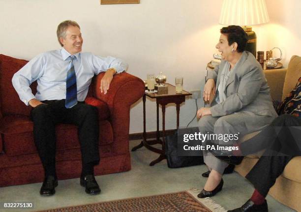 British Prime Minister Tony Blair talks with Hanan Ashrawi a prominent Palestinian at the British Consulate in Jerusalem, Israel.