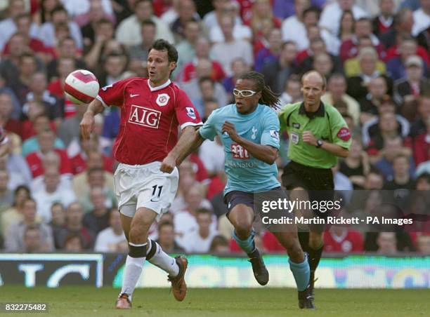 Tottenham's Edgar Davids chases Ryan Giggs of Manchester United