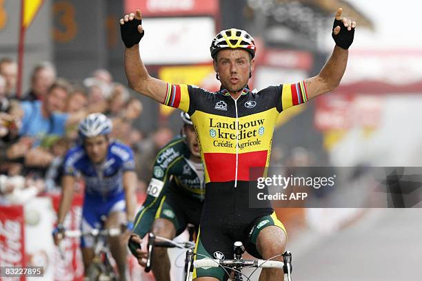 Belgian Sven Nys of Landbouw Krediet team celebrates as he won the cyclocross GP of the Walloon Region in Dottignies, on October 11, 2008. AFP PHOTO...