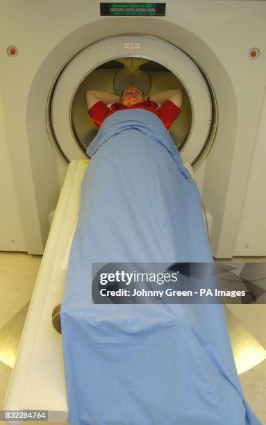 Recently retired weather forecaster Michael Fish has his heart checked through electron beam computed tomography at the European Scanning Centre on...