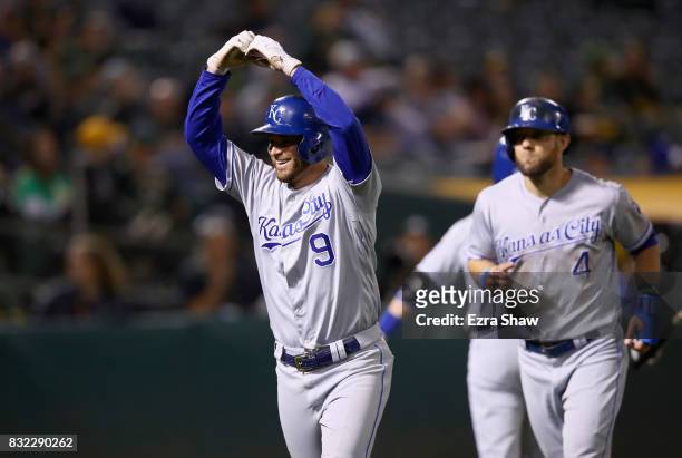 Drew Butera of the Kansas City Royals reacts after hitting a two-run home run in the eighth inning against the Oakland Athletics at Oakland Alameda...