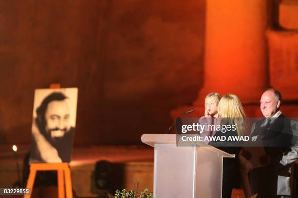 Nicoletta Mantovani Pavarotti , wife of the late Italian Maestro Luciano Pavarotti, holds their doughter Alice at the historic royal tomb called the...