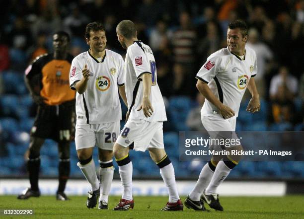 Leeds United's Robbie Blake, , celebrates scoing against Barnet with team mates Kevin Nicholls and Geoff Horsfield , during the Carling Cup second...
